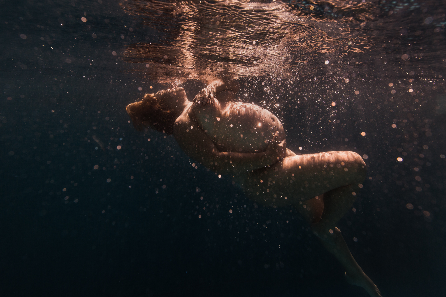 Photographe grossesse aquatique underwater