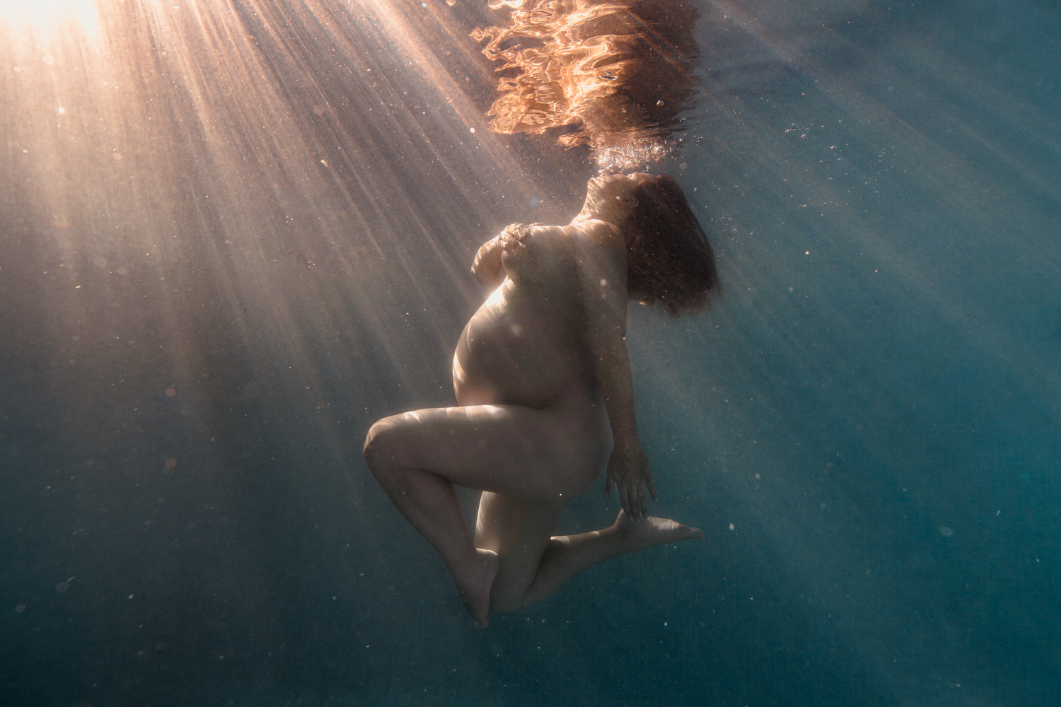 Photographe underwater grossesse